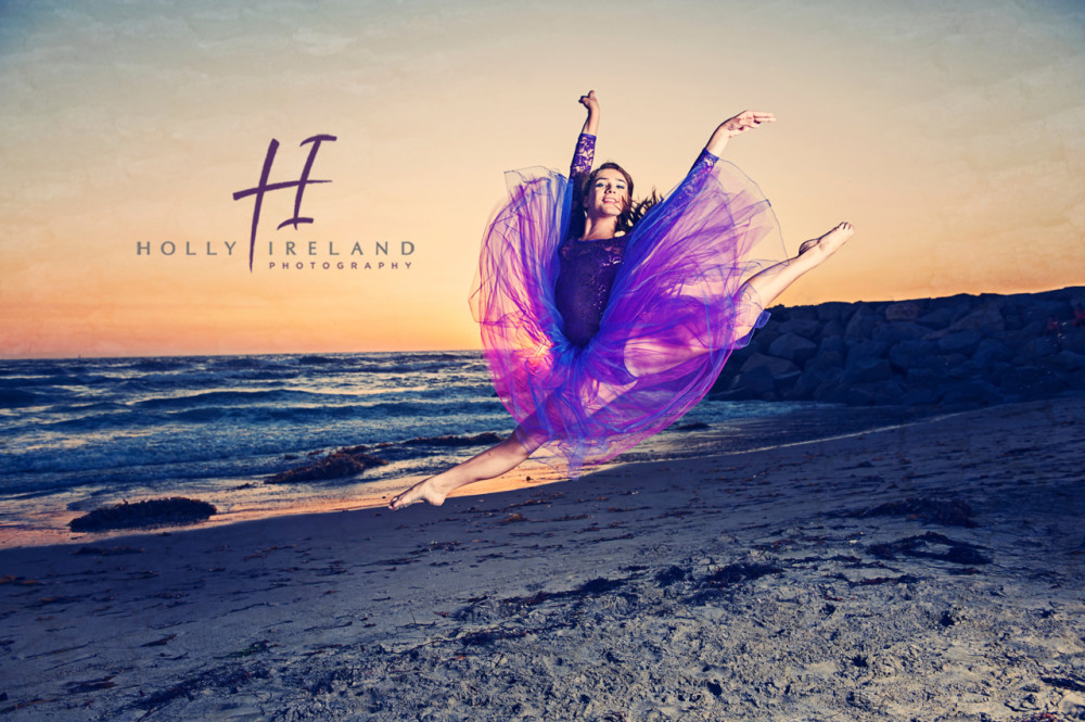Beautiful and creative dance photographer takes this photo at the beach in San Diego CA