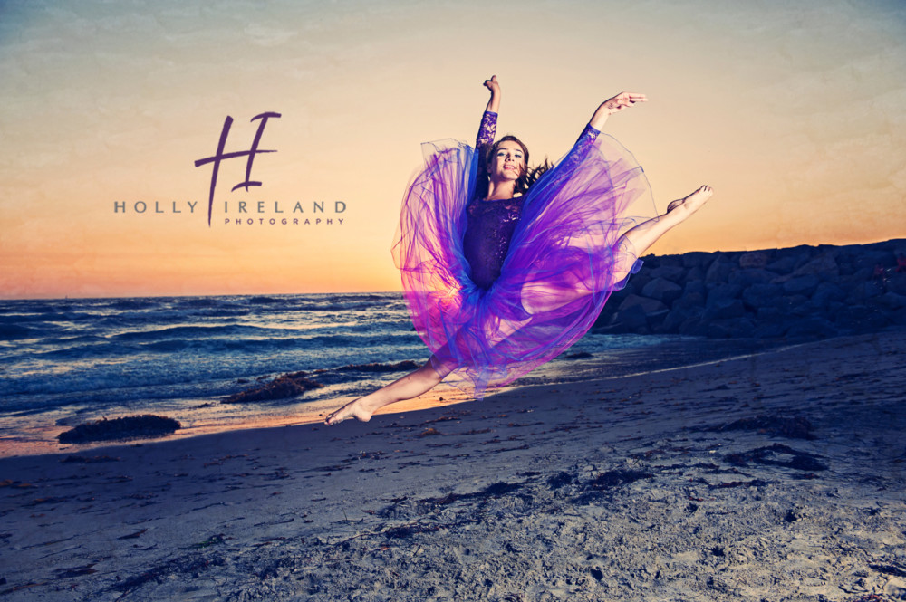 Beautiful and creative dance photographer takes this photo at the beach in San Diego CA