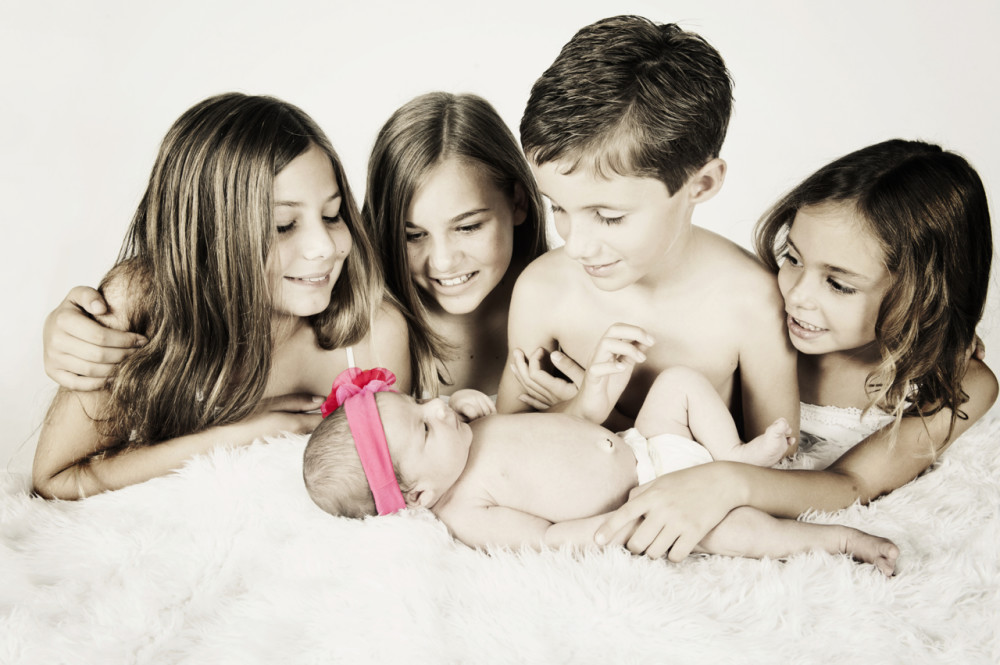 San Diego newborn sibling family photography taken in studio in Carlsbad