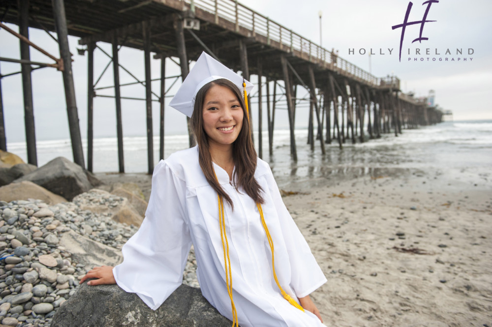 Cool cap and gown photography at the beach in CA