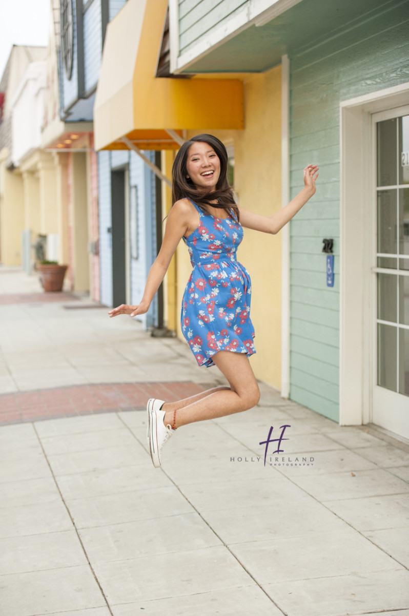 Fun jumping high school senior photography in Oceanside CA