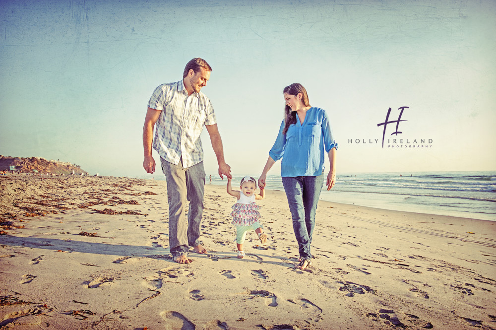Carlsbad family photography at the beach in San Diego with a cute baby