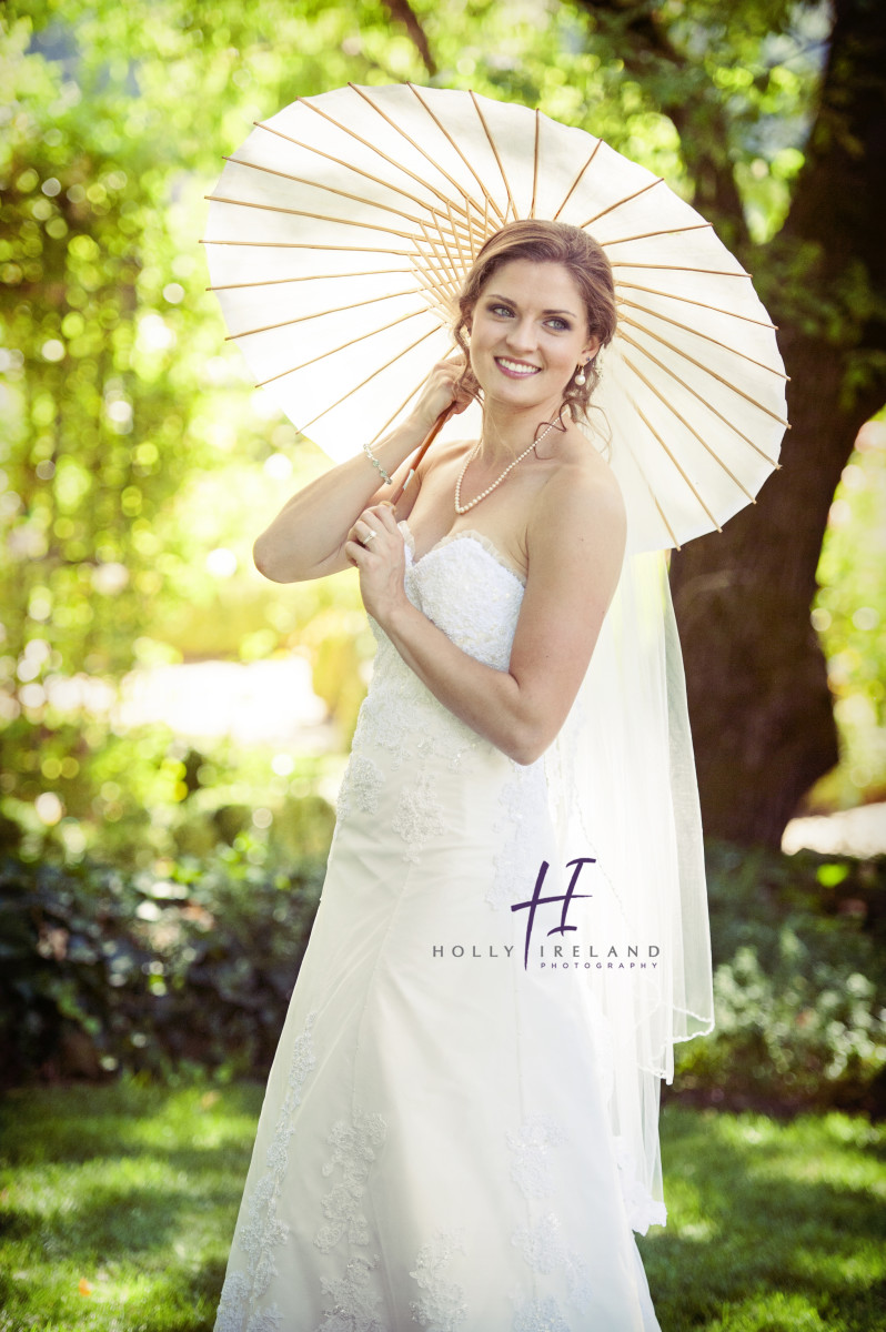 Amazing bride photo with a vintage umbrella in Napa CA  www.hollyireland.com