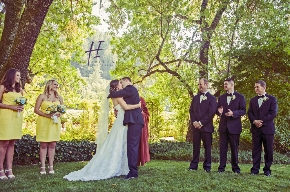 First kiss at a wedding ceremony in Napa  www.hollyireland.com