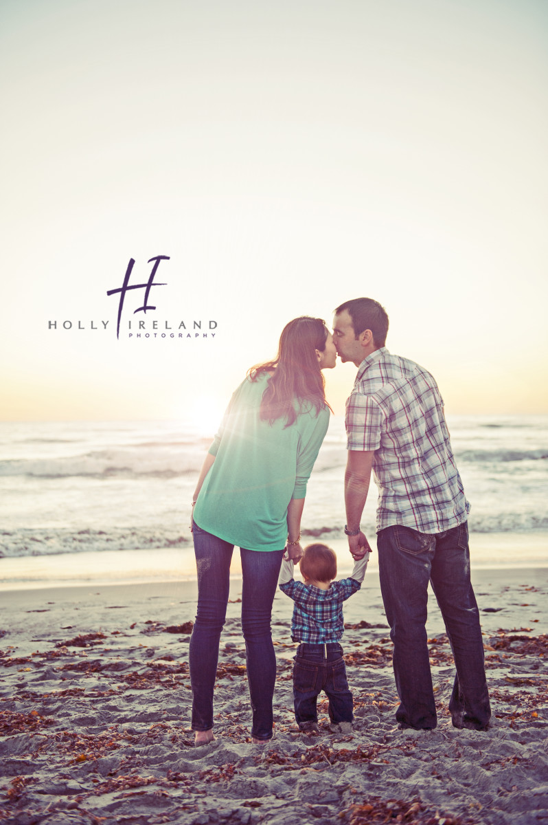 Beautiful moment of family photography at the beach www.hollyireland.com
