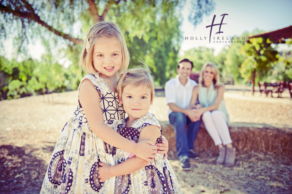 Adorable sibling cute ideas for holiday photos in Carlsbad CA