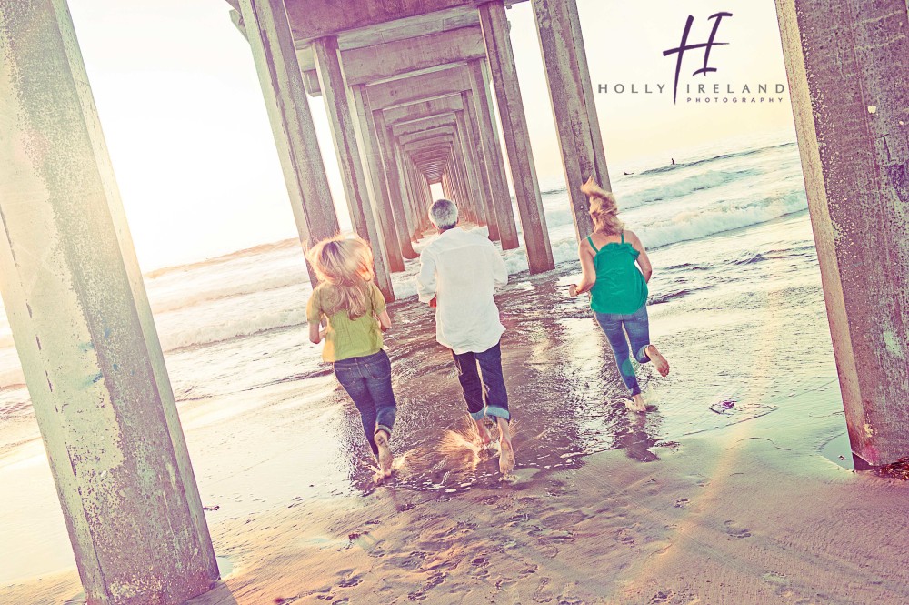 creative and candid  beach pier photography www.hollyireland.com