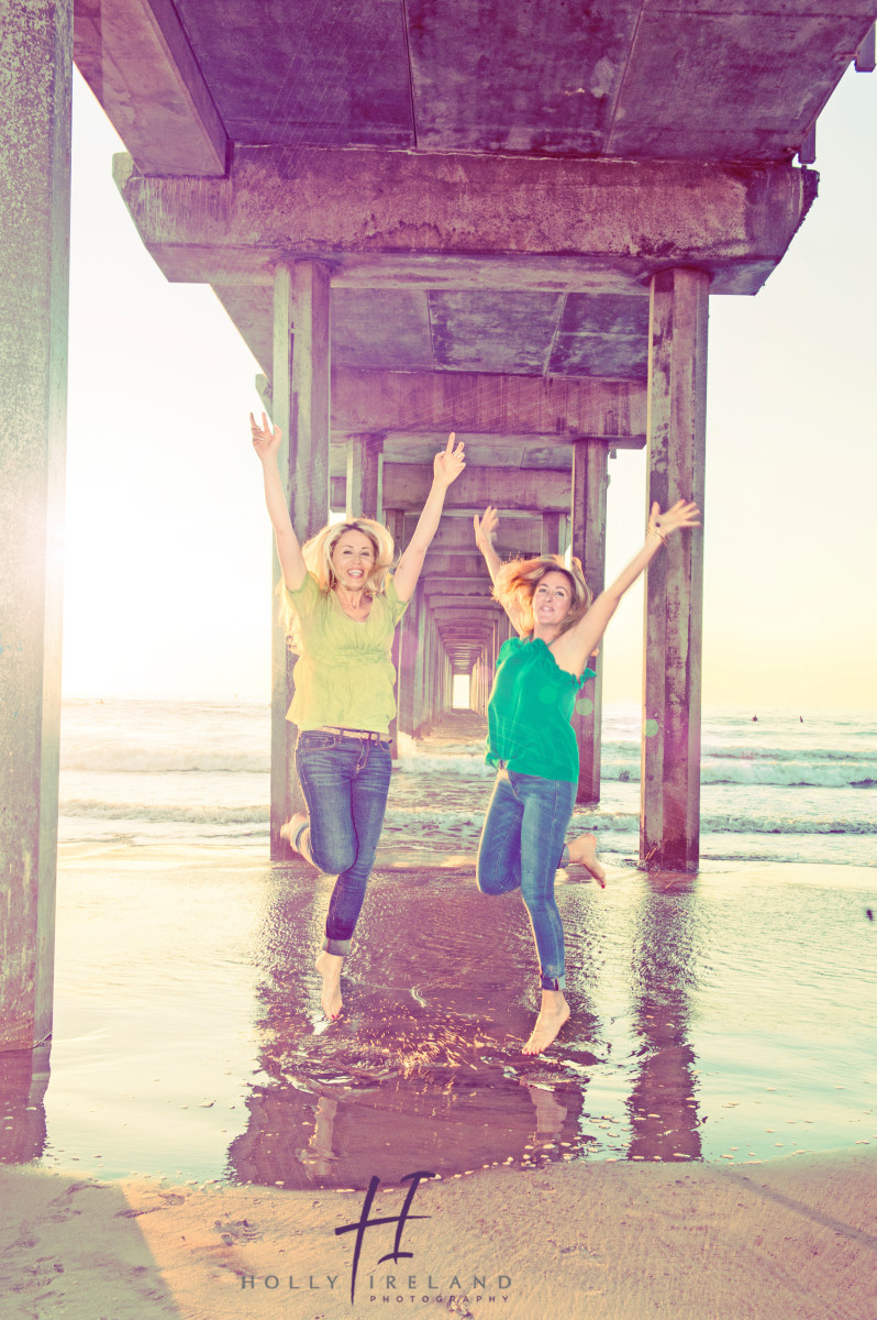 Jumping photos under a pier www.hollyireland.com