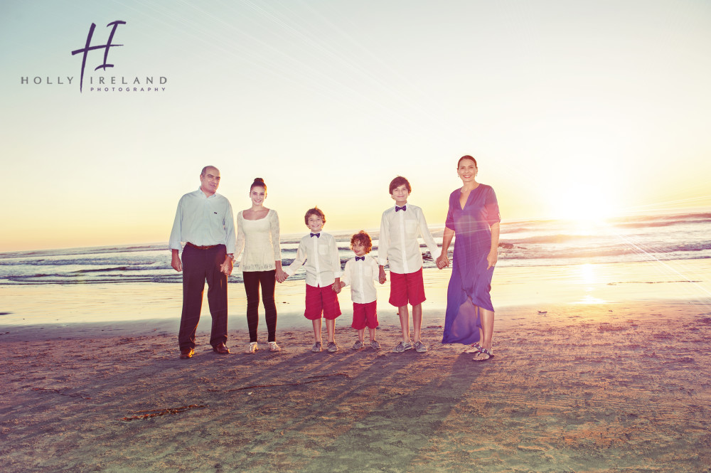 beautiful family photos at sunset at the beach in Del Mar CA