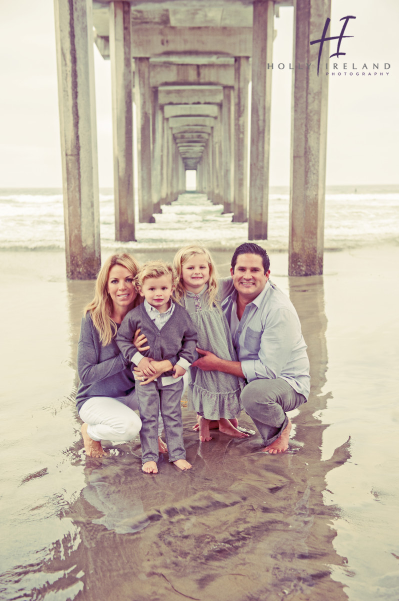 Amazing family under a beach pier in La Jolla