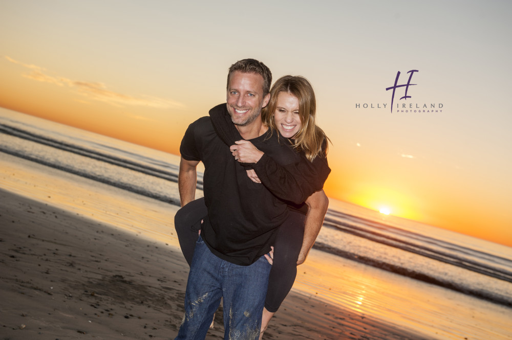 Fun beach sunset engagement photographs