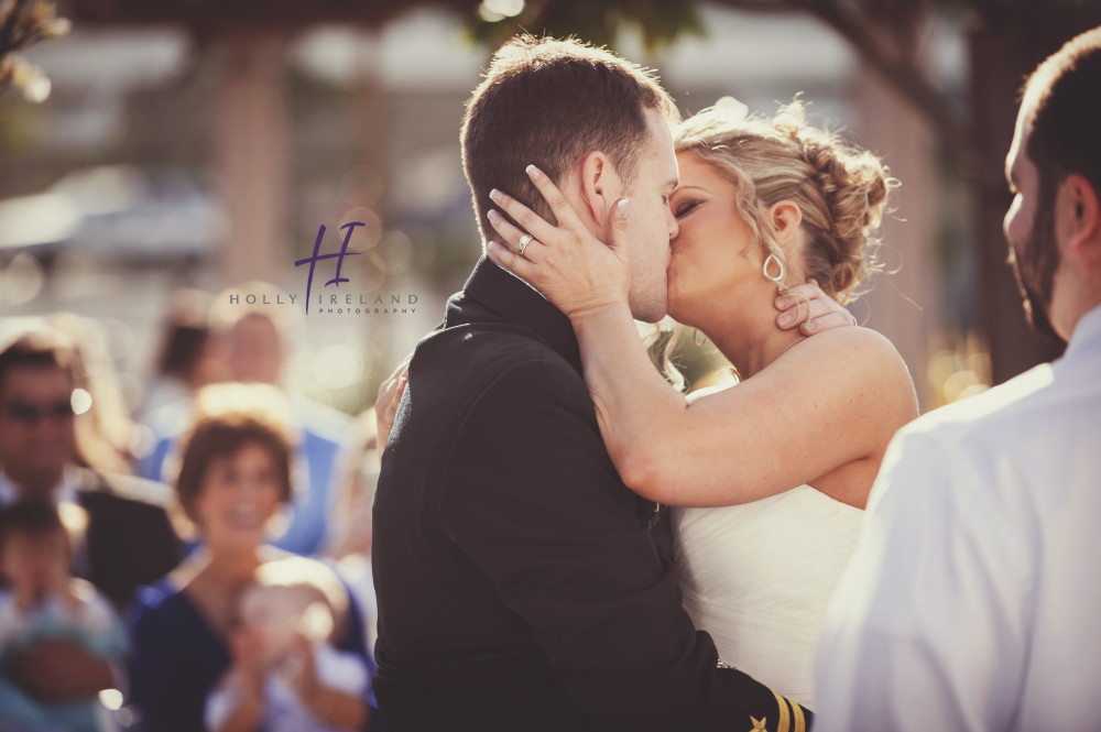 Wedding ceremony kiss photography