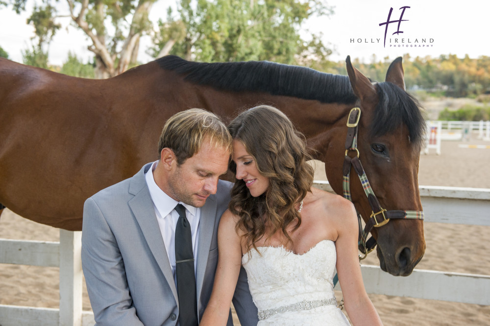 ranch style bride and groom photos with a horse