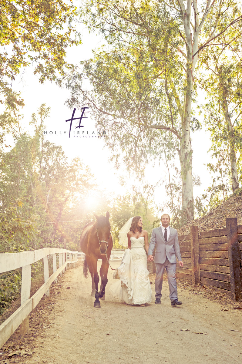 ranch style bride and groom photos with a horse