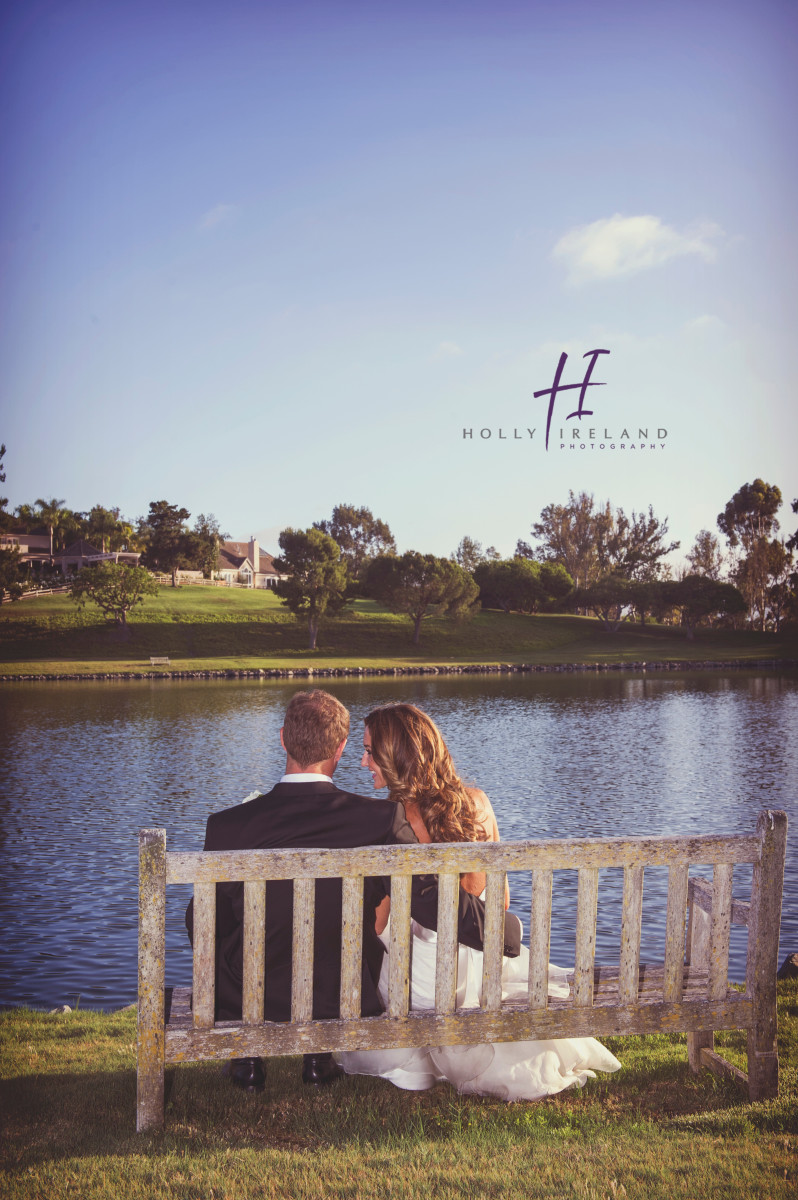 Bride and groom on a lake in SAn Diego