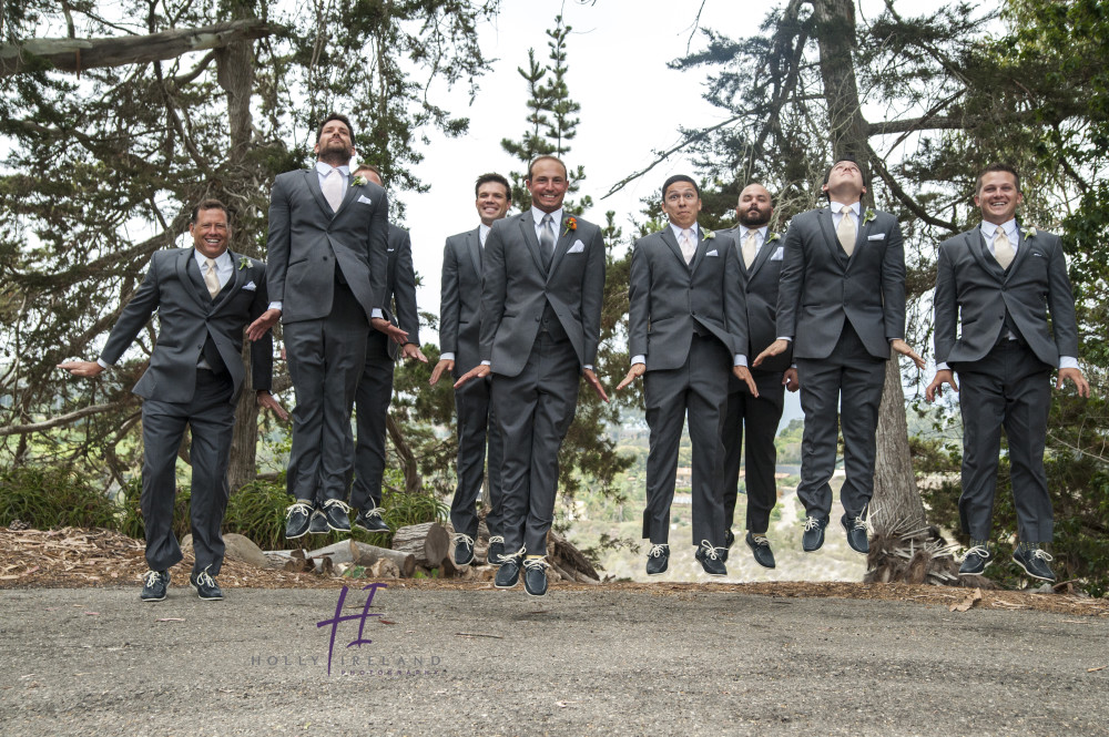 fun grooms jumping photo