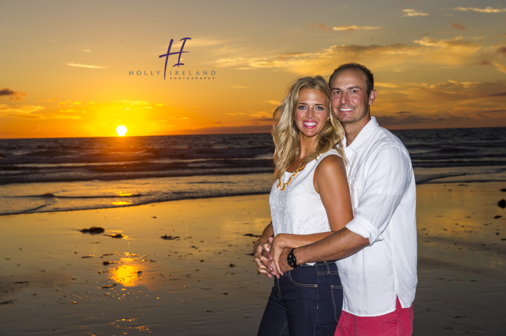 Susnet beach engagment photos under a pier