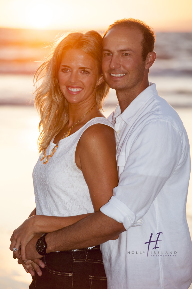 Susnet beach engagment photos under a pier