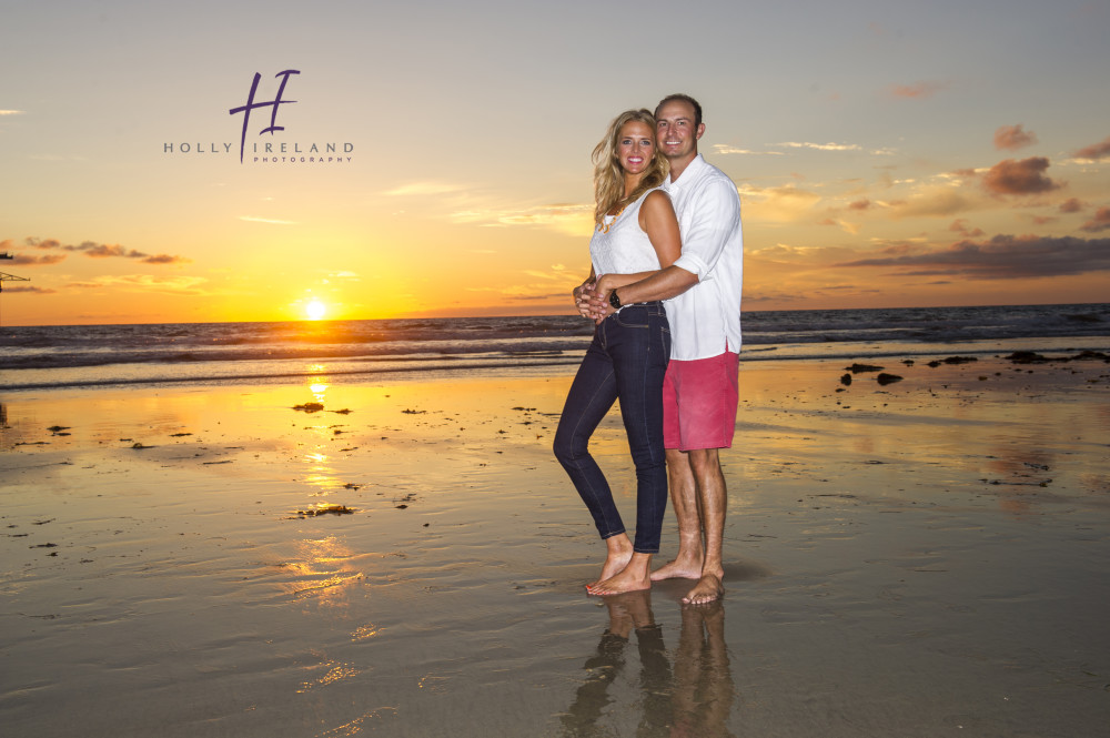 Susnet beach engagment photos under a pier