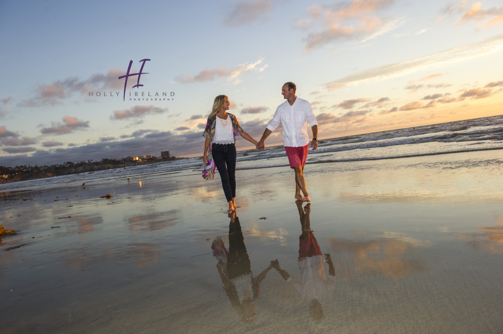 Susnet beach engagment photos under a pier