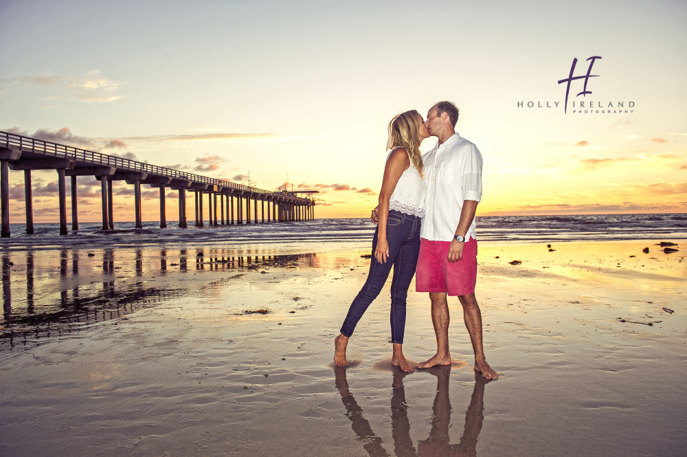 Susnet beach engagment photos under a pier