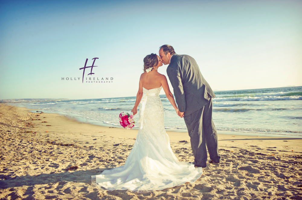 Coronado beach wedding photographer and photos with a bride and groom