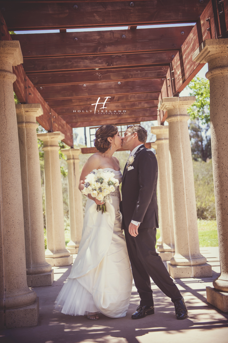 kissing bride and groom wedding