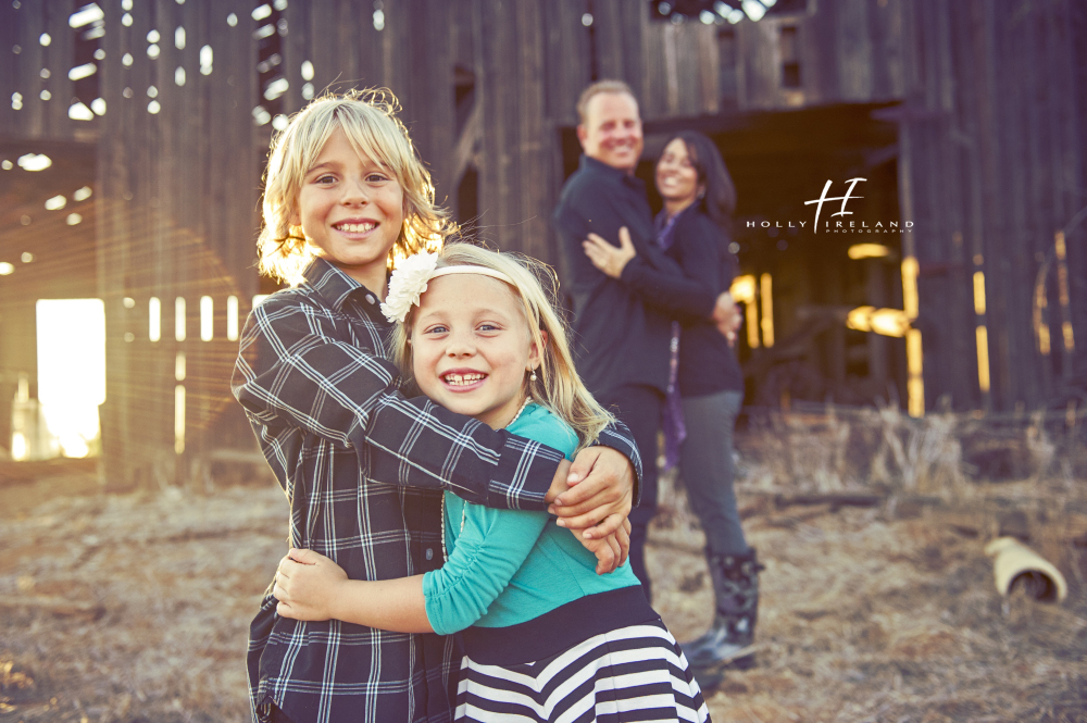 candid and creative family photos at a rustic barn