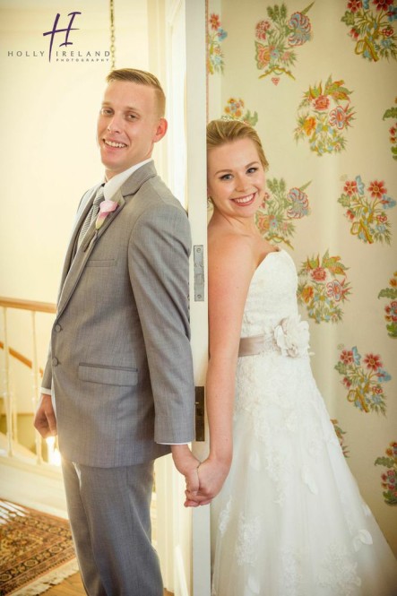 bride and groom holding hands rustic 