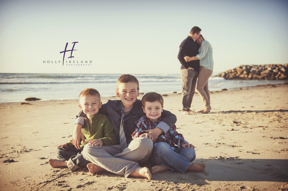 fun creative family beach photos in San Diego California