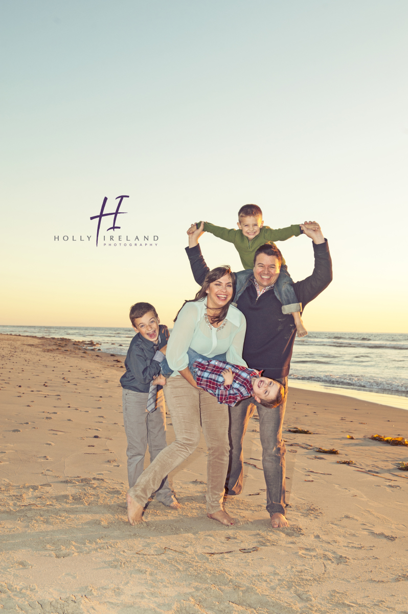 fun creative family beach photos in San Diego California