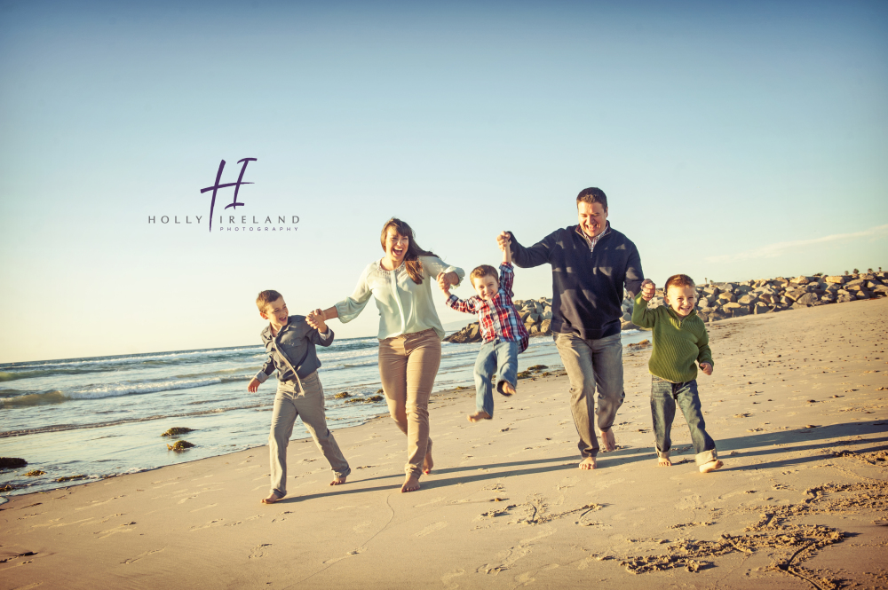 fun creative family beach photos in San Diego California