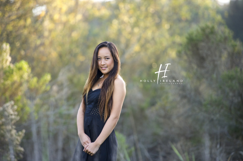 Beautiful california high school senior photos of a girl on a trial and at the beac