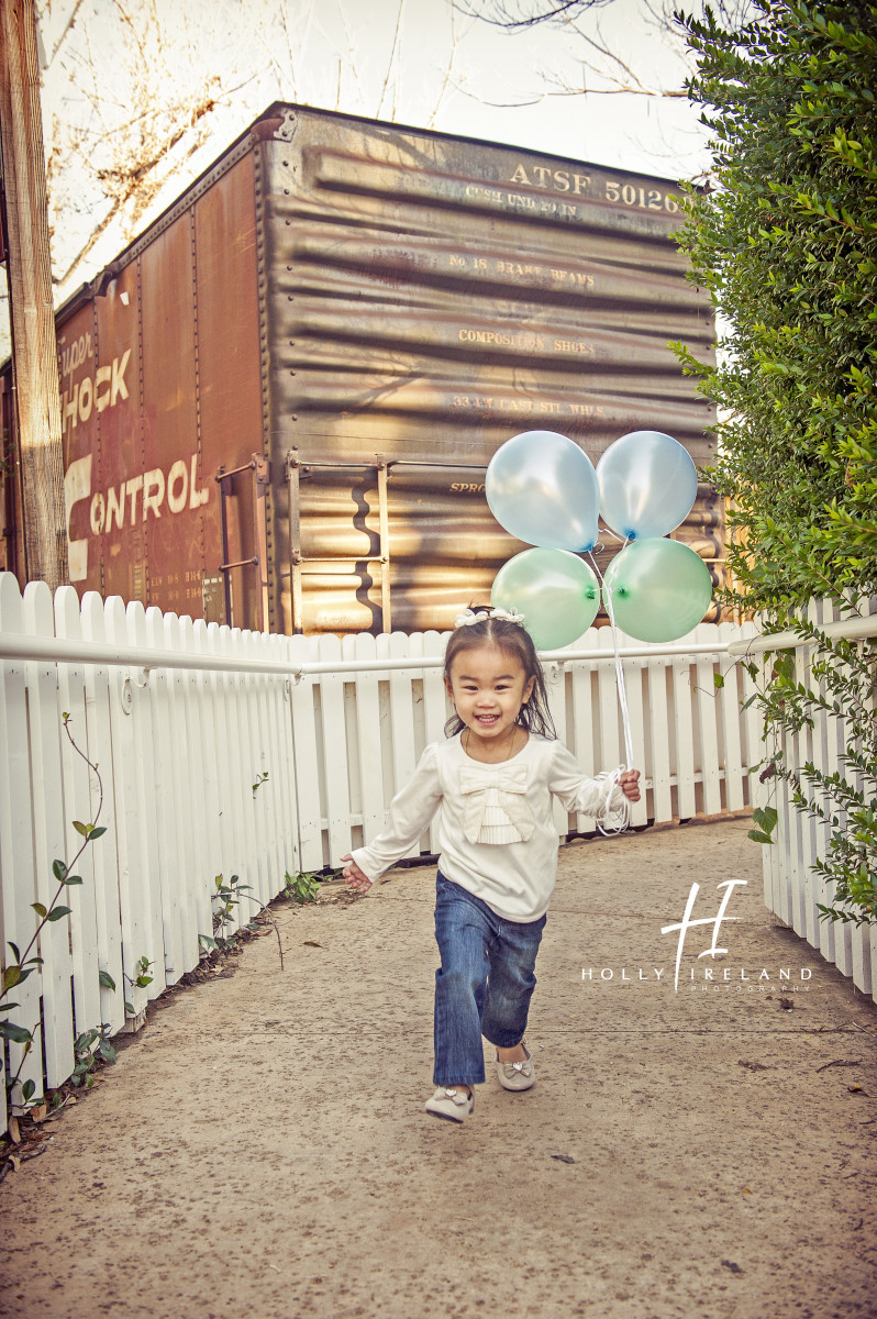 cute family candid photos in San Diego Ca old poway train park