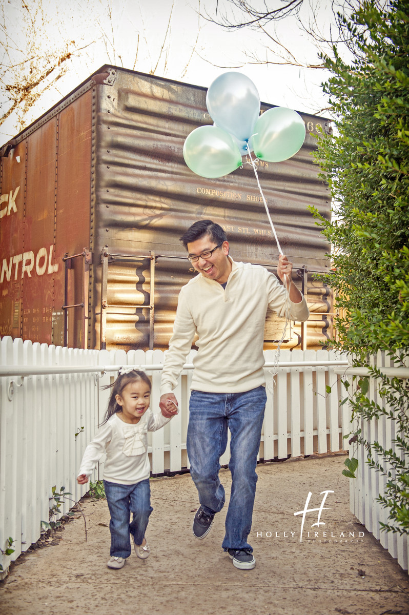 cute family candid photos in San Diego Ca old poway train park