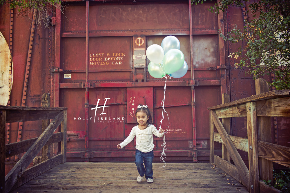 cute family candid photos in San Diego Ca old poway train park